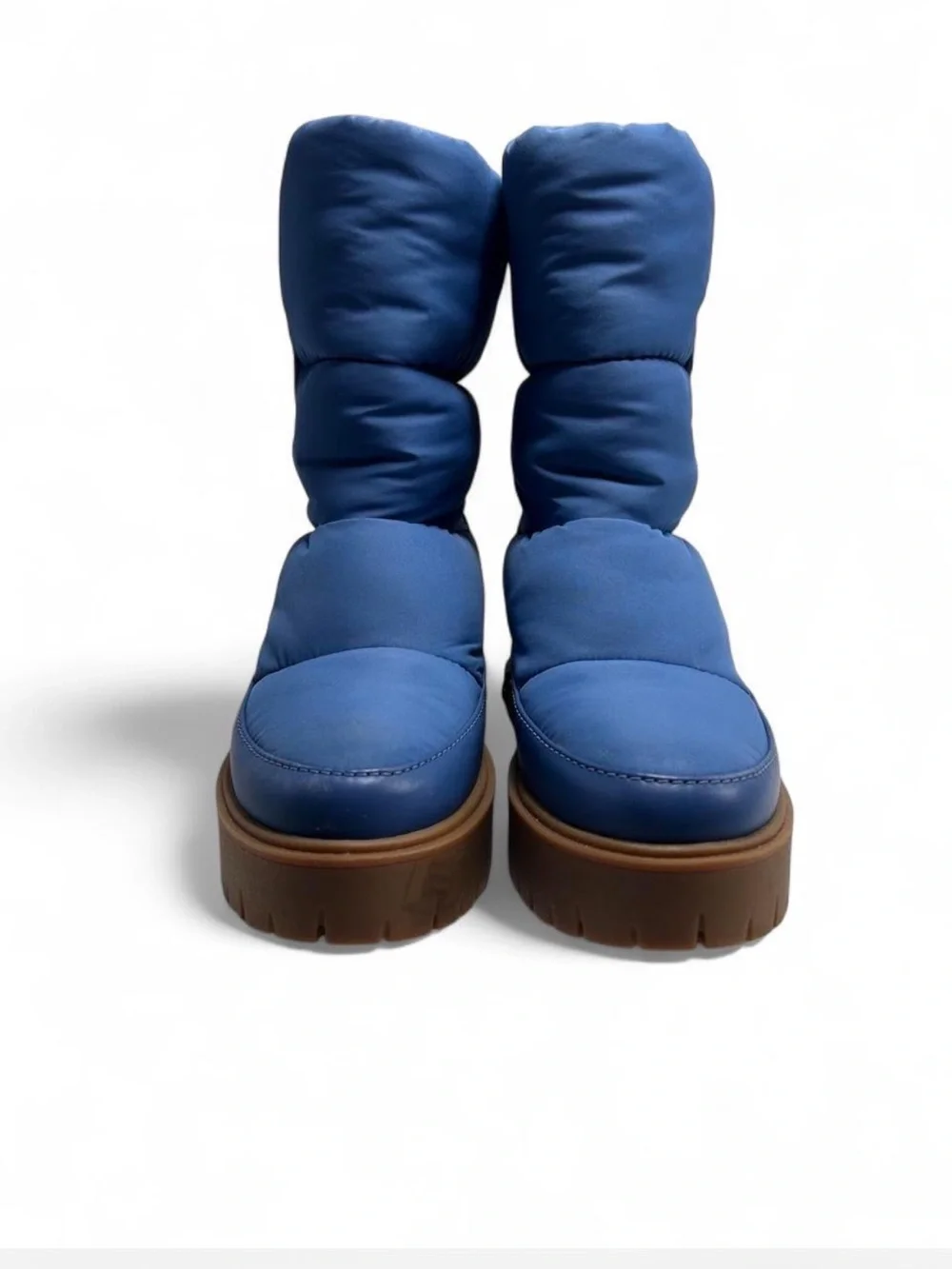 Coach Rya Boots inSky Blue. Quilted puffer-style nylon, leather upper.